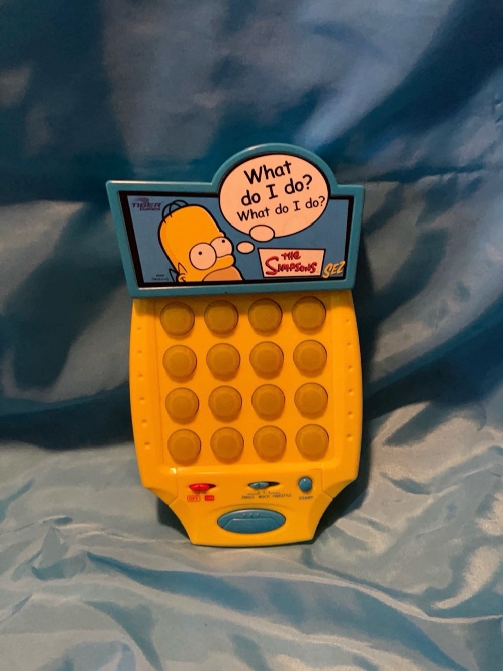 Hasbro Blue and Yellow The Simpsons Handheld Game Console